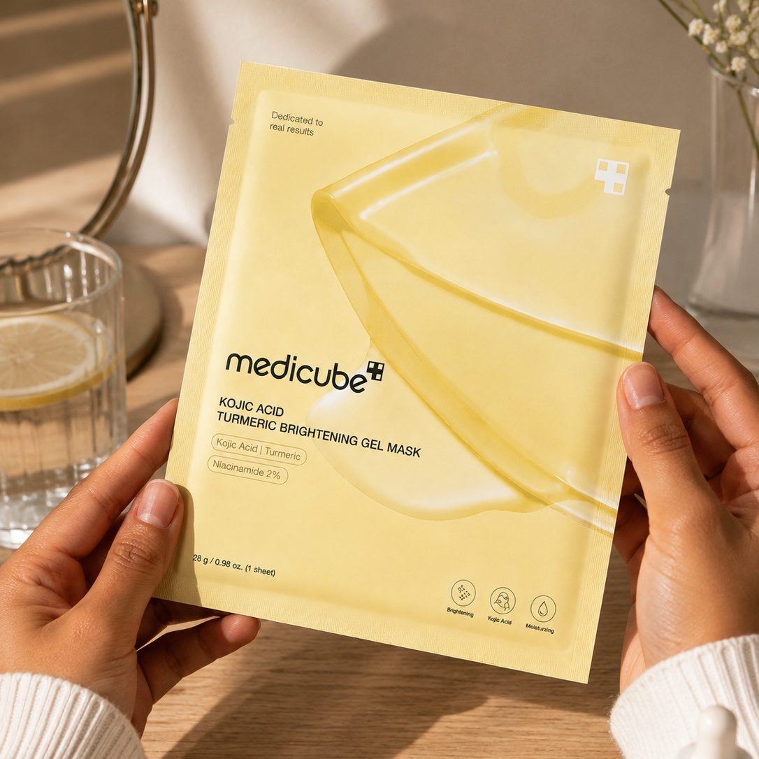 The sachet held in both hands at a dressing table