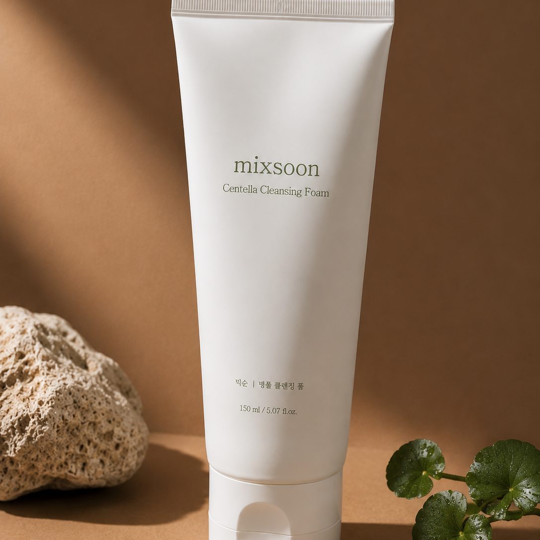 The tube beside a pumice stone and greenery
